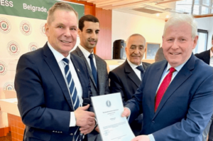 Dr Hugh Milroy CEO of Veterans Aid receiving an award from WVF President Mr Dan-Viggo Bergtun